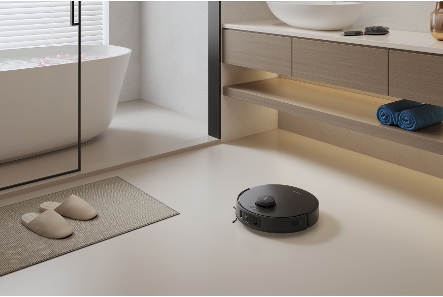 deebot robot vacuum vacuuming in bathroom