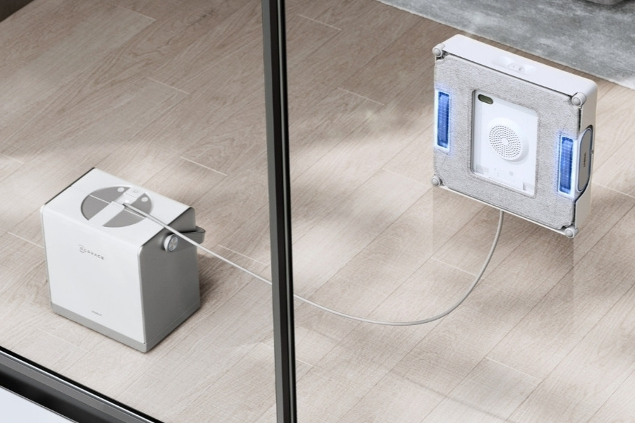 winbot robot window cleaner working on floor-to-ceiling glass panel