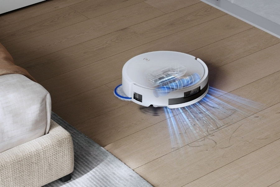 deebot robot vacuum cleaner vacuuming pet hair from the carpet