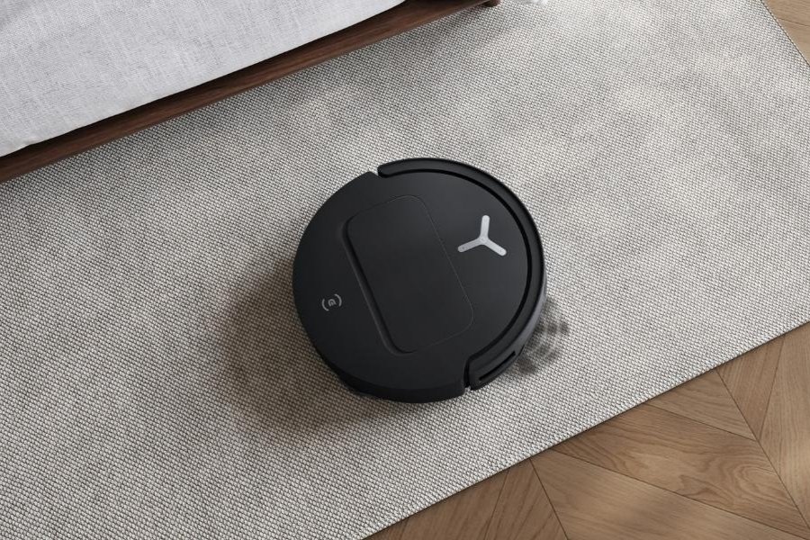 deebot robot vacuum cleaning a jute carpet