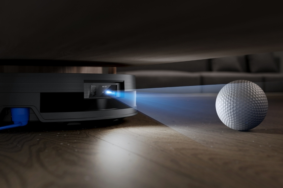 deeboto robot vacuum detecting a golf ball under furniture
