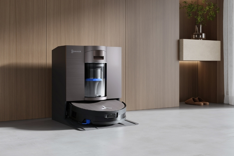 deebot robot vacuum cleaner charging at the base