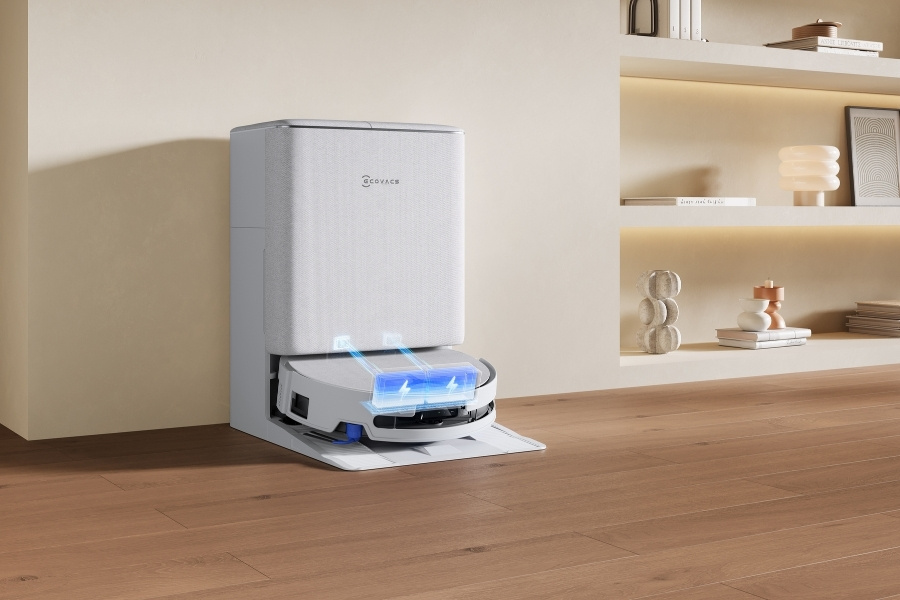 deebot robot vacuum charging at the station