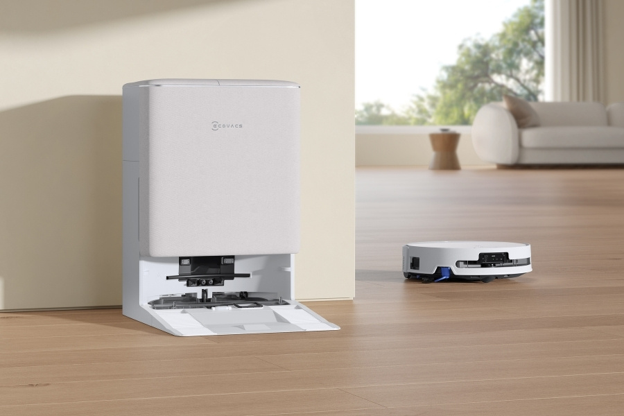 deebot robot vacuum cleaning near the docking station
