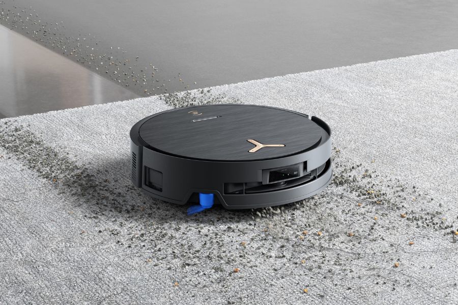 der deebot saugroboter reinigt schonend schmutz vom teppich
