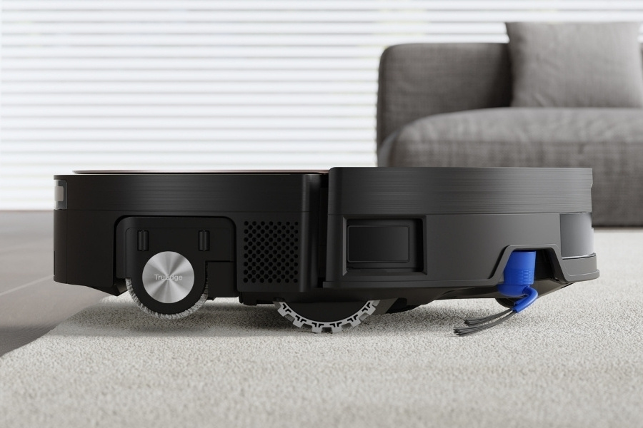 deebot saugroboter reinigt einen teppich