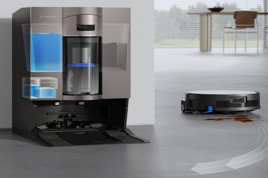 deebot saugroboter wischt boden nahe ladestation