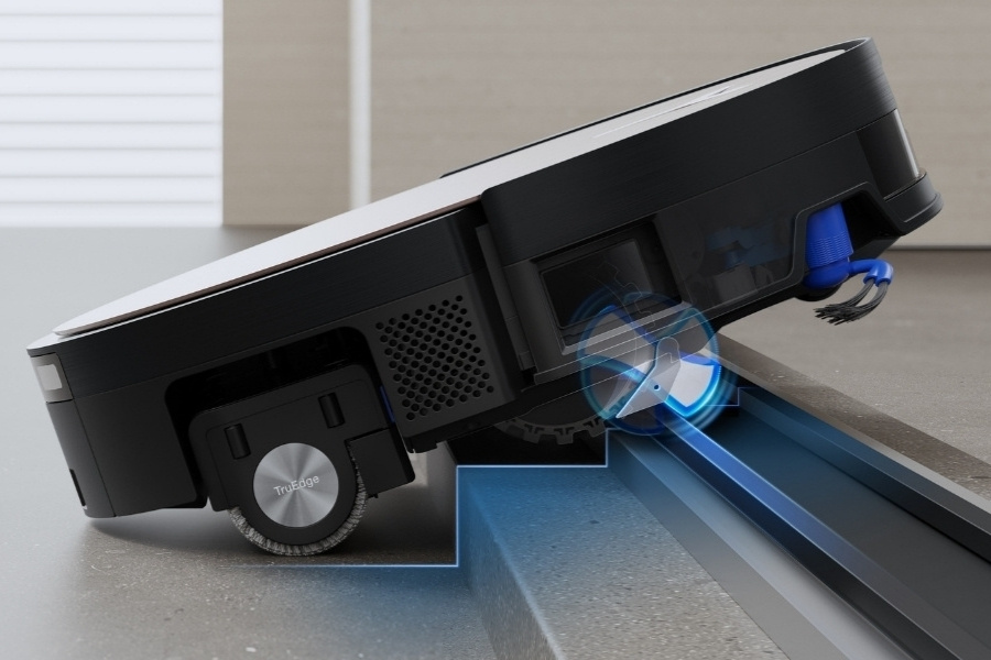 deebot saugroboter uberwindet eine schwelle