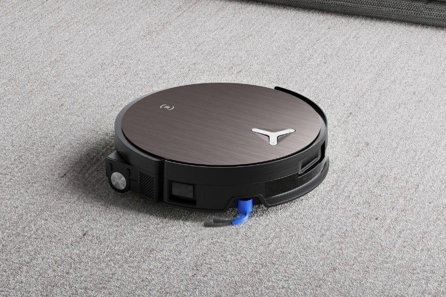 deebot saugroboter reinigt teppich