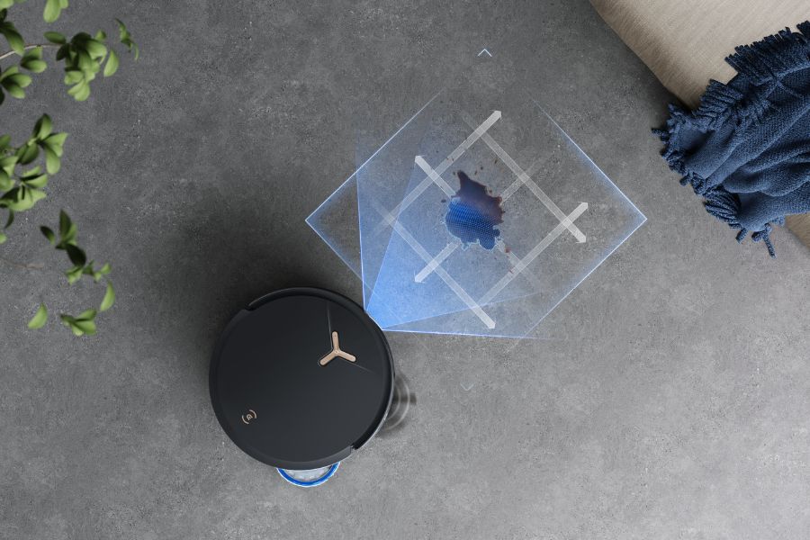 aspirateur robot noir deebot detecte une tache