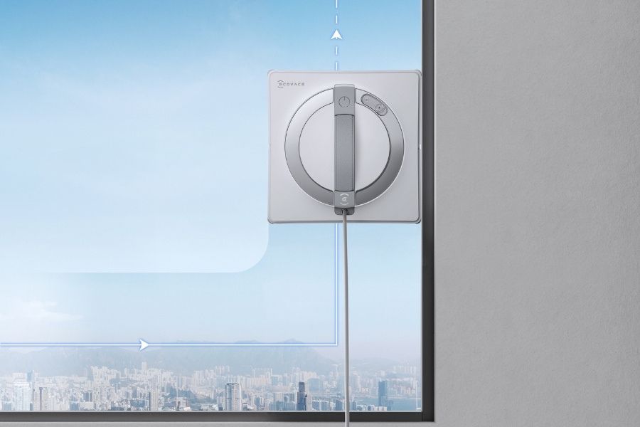 robot lave vitre winbot nettoyant une vitre