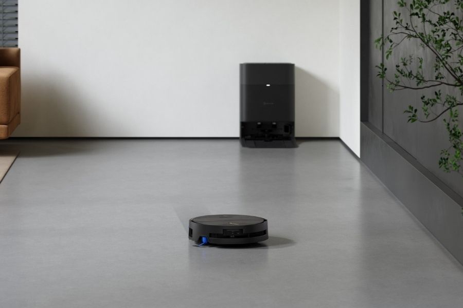 aspirateur robot deebot connecte au wifi nettoyant une piece