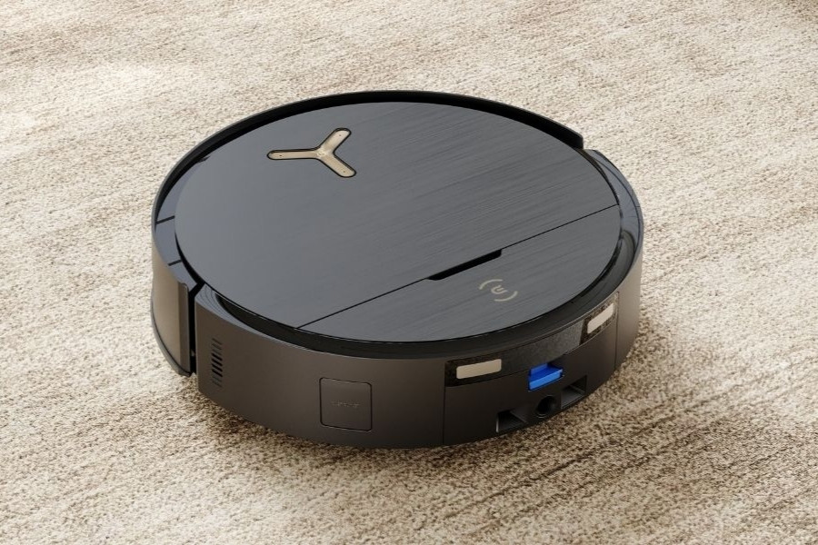 aspirateur robot deebot aspirant un tapis