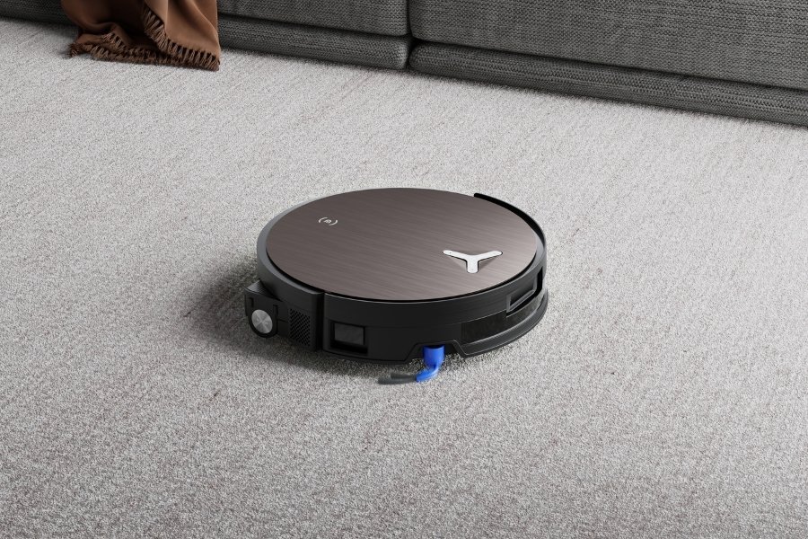 aspirateur intelligent deebot nettoyant un tapis
