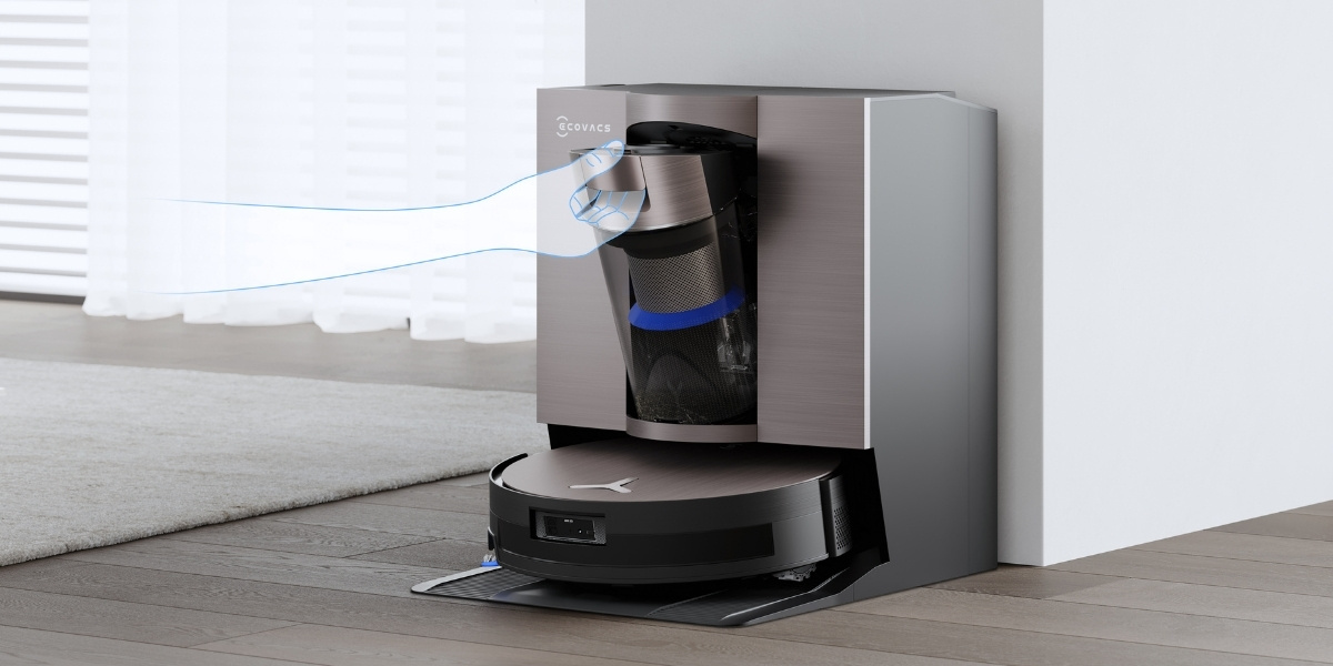 retrait du bac a poussiere d un aspirateur robot deebot sans sac