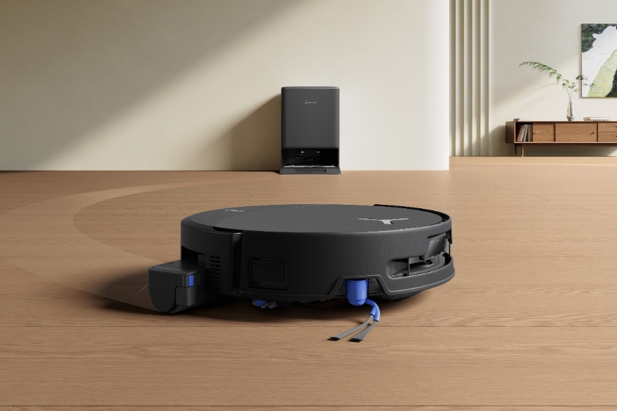 aspirateur autonome deebot nettoyant un sol en bois