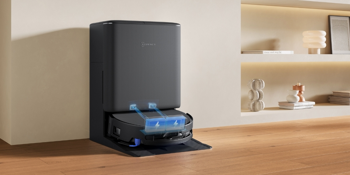 aspirateur automatique deebot qui se recharge dans sa station