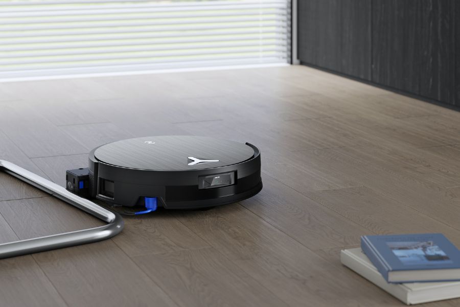 aspirateur robot deebot nettoie du parquet