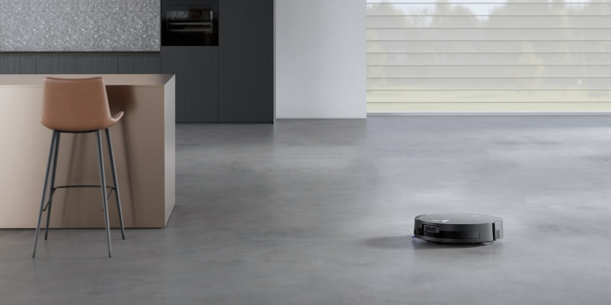 aspirateur robot deebot nettoyant pres du plan de travail