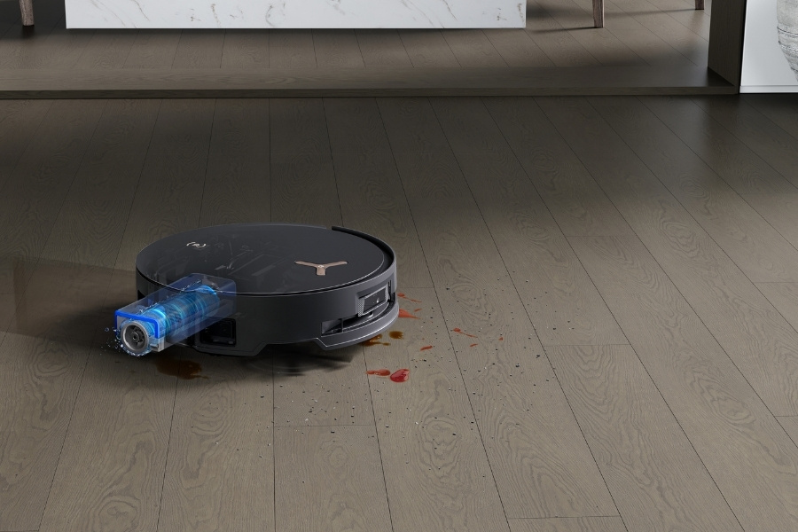 deebot robot vacuum mopping spills on the floor
