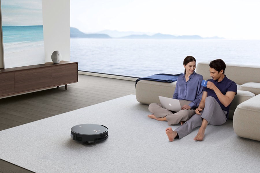 deebot robot vacuum a rug in a living room