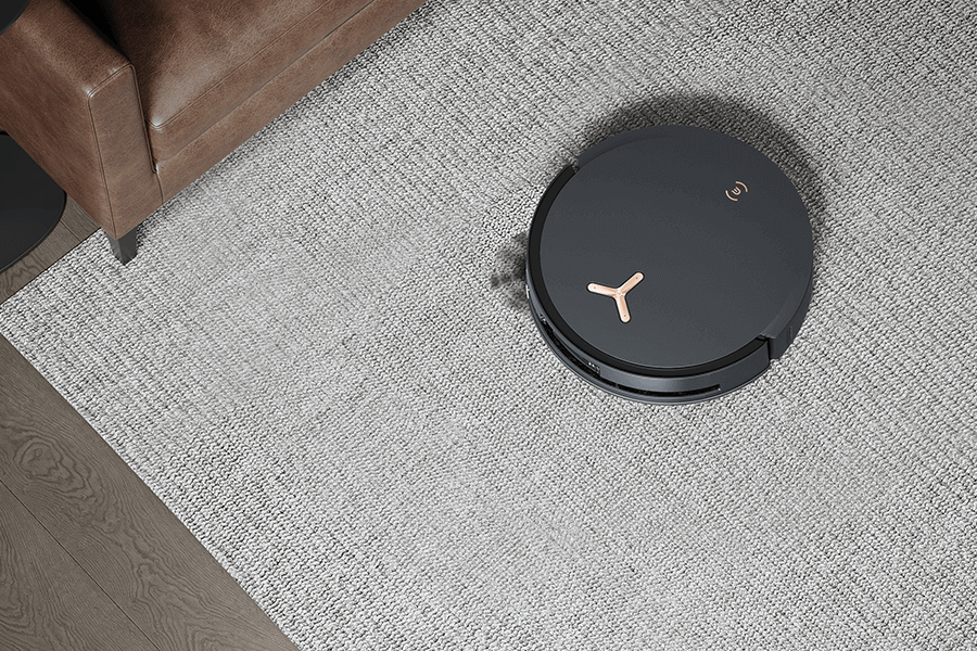 deebot robot vacuum cleaning carpeted floor