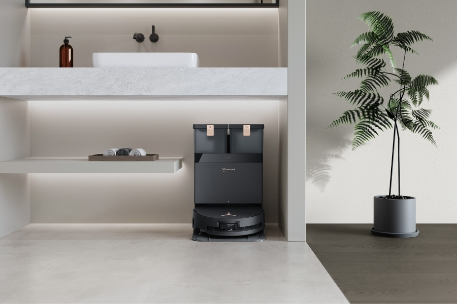 deebot robot vacuum charging at the station in the bathroom marble floor