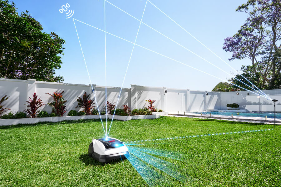 the lawnmower working in the yard