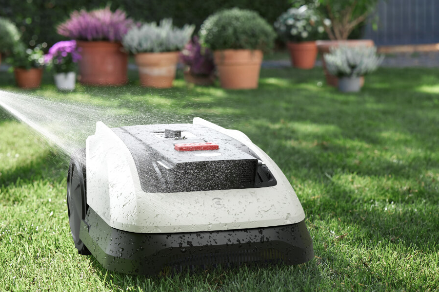 goat robot lawn mower getting a rinse