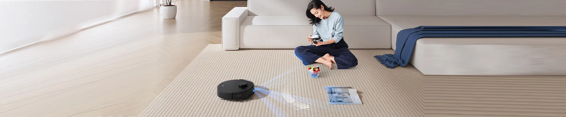 deebot t30s robot vacuum with lady working from home