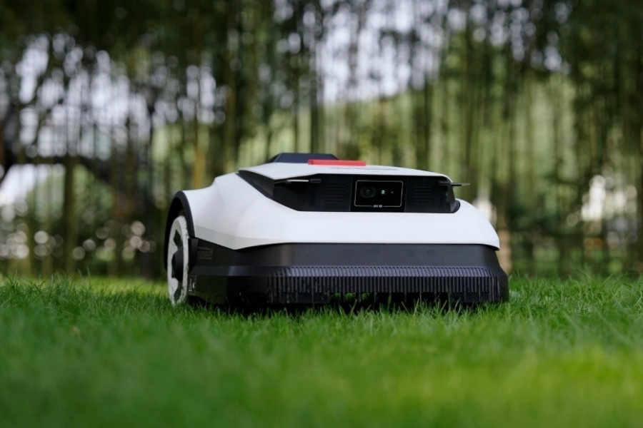 goat robot lawn mower mowing a lawn