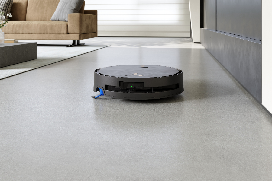 a robot vacuum cleaner working in a living room