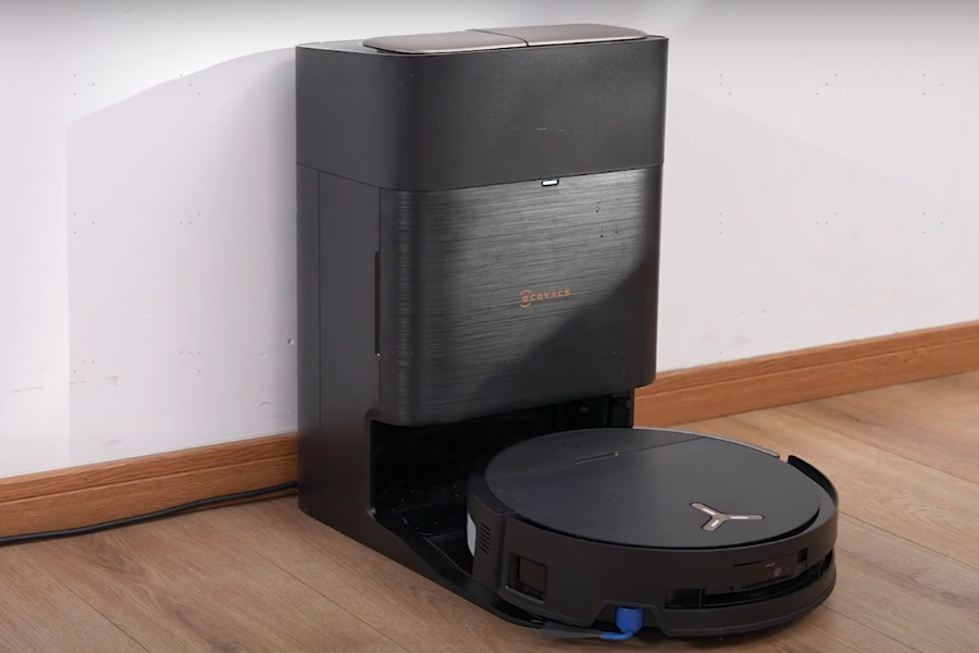 deebot robot vacuum returning to dock for charging