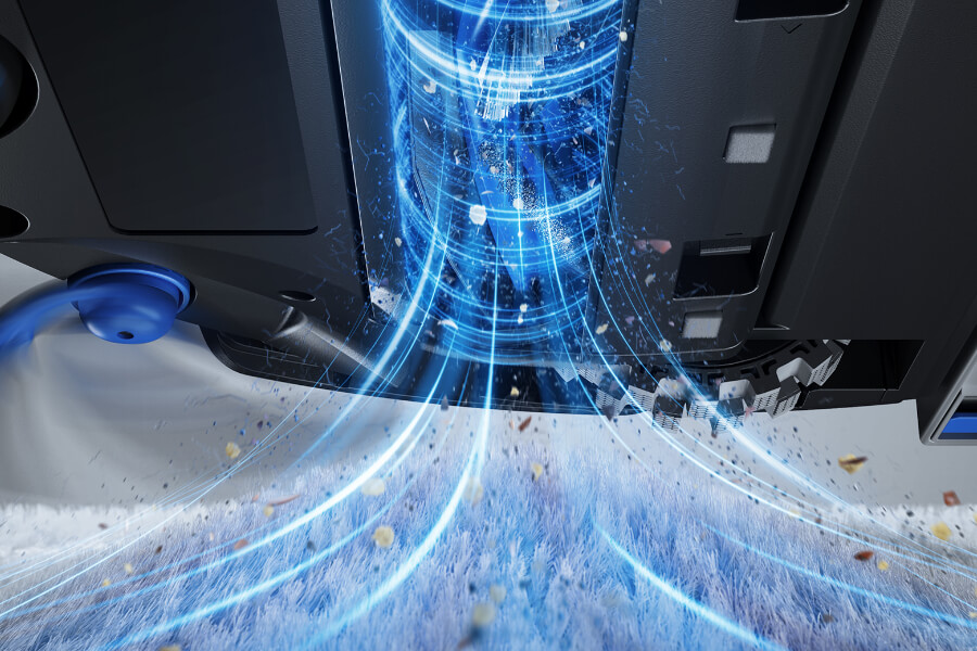 close-up of a robot vacuum cleaner pulling dirt out of a carpet