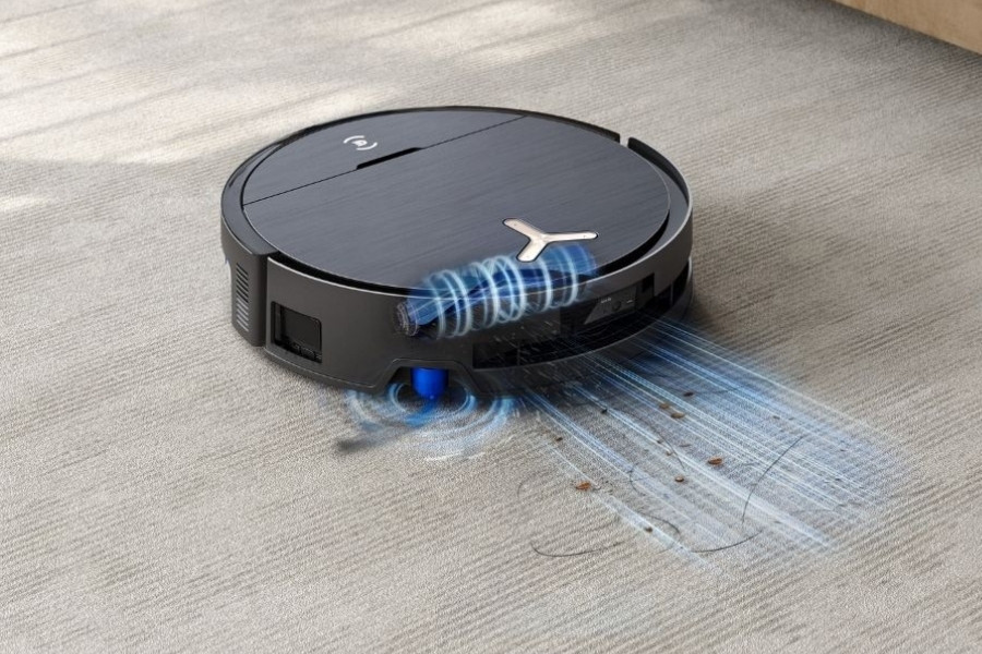 deebot robot vacuum cleaner vacuuming pet hair from the carpet
