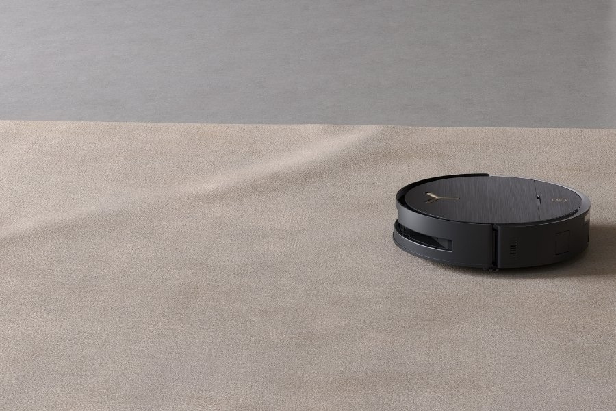 deebot robot vacuum cleaning a jute carpet