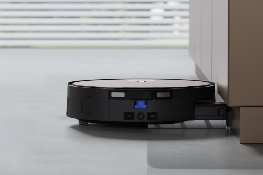 deebot robot vacuum cleaning cabinet edges on stone floors