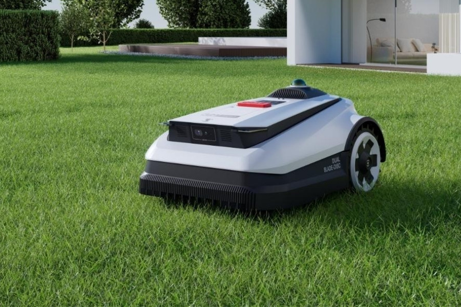 goat lawn mower mowing a backyard