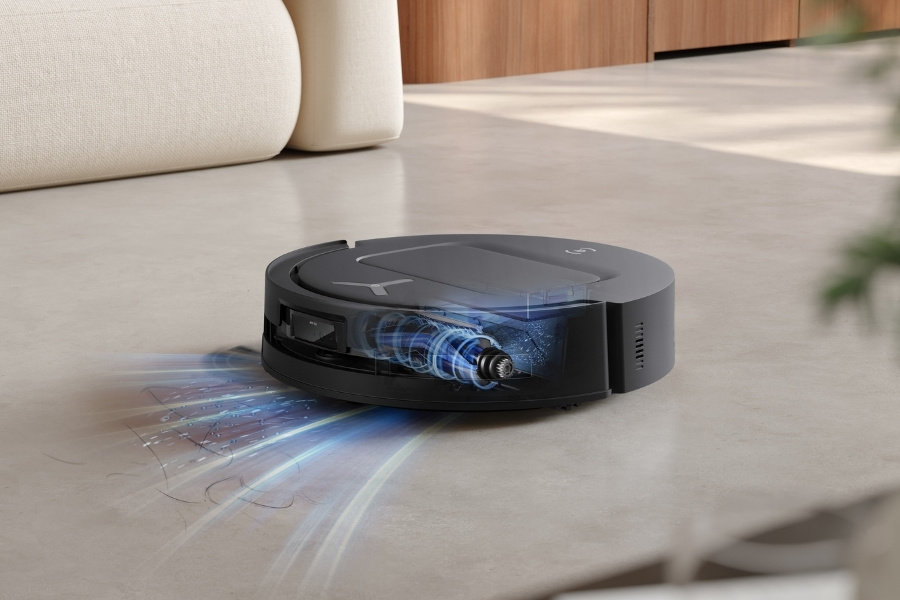 deebot robot vacuum vacuuming hair from the floor