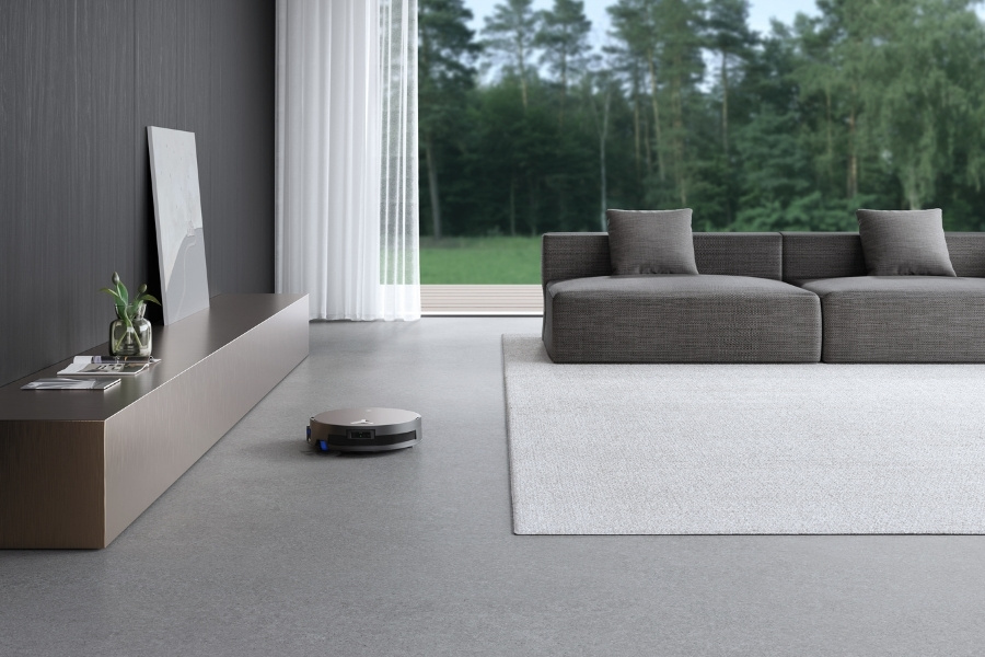 deebot robot vacuum cleaning living room