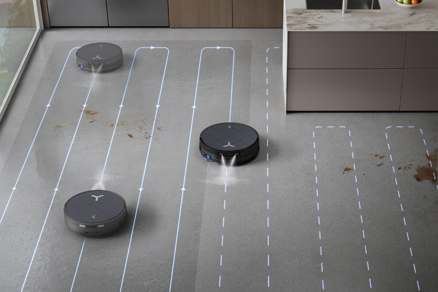 deebot robot vacuum cleaning in a systematic pattern